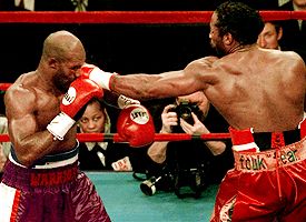 Evander Holyfield and Lennox Lewis