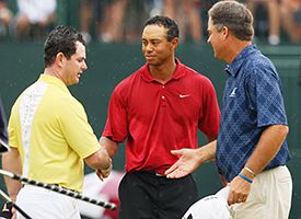 Tiger Woods (C), Rory Sabbatini of South Africa (L) and Kenny Perry