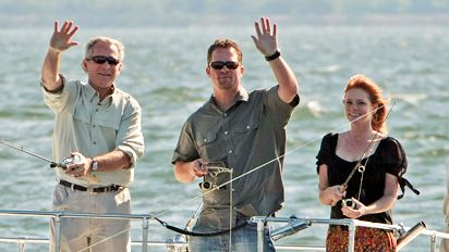 President George W. Bush (L), Chris Fischer (C), and Melissa Fischer (R)