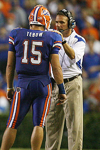 Urban Meyer and Tim Tebow