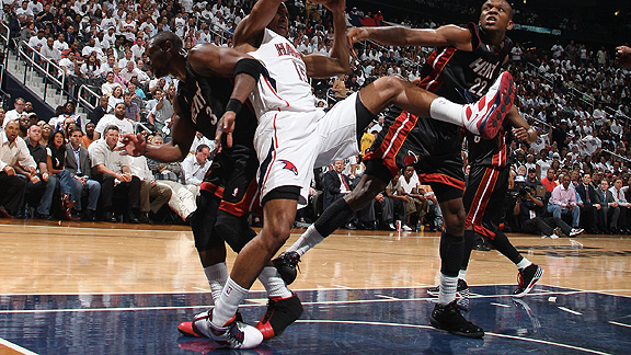 dwyane wade getting dunked on. Nuggets guard J.R. Smith gets