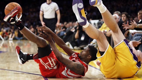 Los Angeles Lakers' Jordan Farmar drives the baseline against Houston  Rockets' Chuck Hayes during Game 5 of their Western Conference semifinals  at Staples Center in Los Angeles on May 12, 2009. The