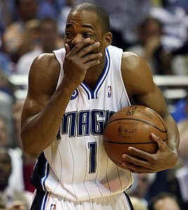 Miami Heat guard Rafer Alston, right, attempts to steal the ball