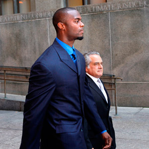 Former New York Giants receiver Plaxico Burress pleads guilty, to serve 2 years in prison