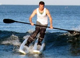 Surfing and skiing at the same time.