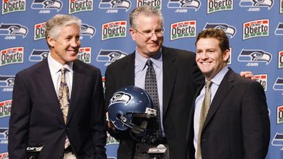 Pete Carroll, Tod Leiweke, John Schneider