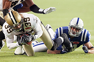 Ronald Martinez/Getty Images Hank Baskett, right, was unable to come 