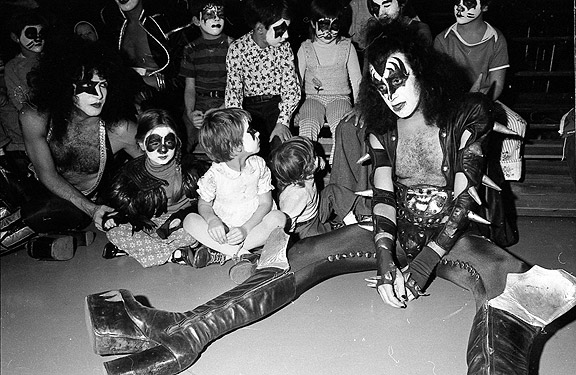 Kiss with Cadillac High School football team members, 1975. Photo