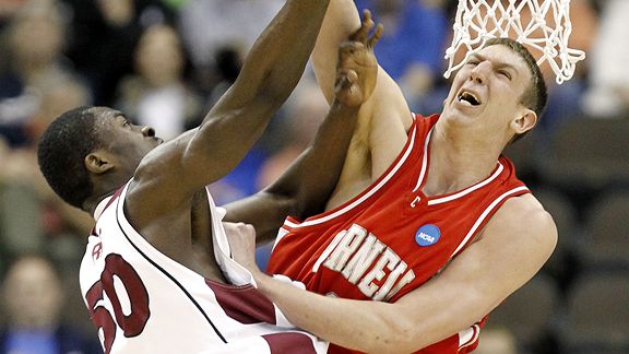 Michael Eric (50) has his shot blocked by Jeff Foote