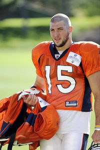 AP Photo/Jack Dempsey Tim Tebow got a new haircut on Tuesday 