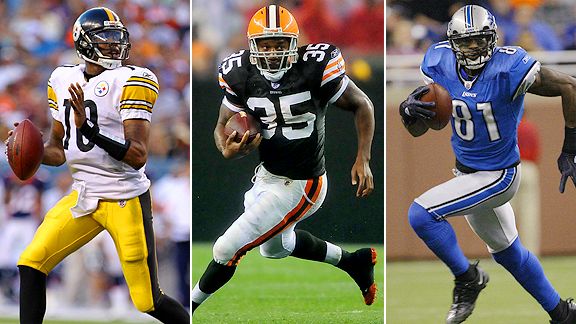 Dennis Dixon, Jerome Harrison and Calvin Johnson
