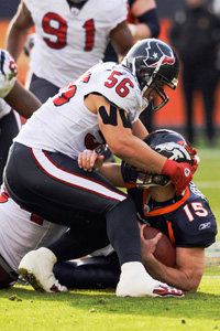Tim Tebow and Brian Cushing