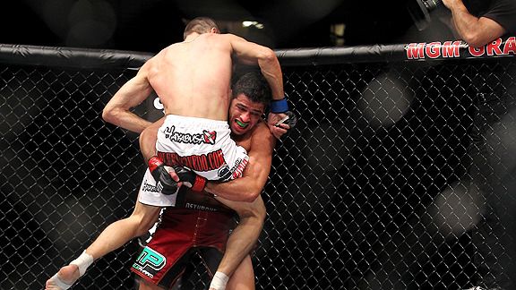 Swept off his feet: Renan Barao spoiled Cole Escovedo's UFC debut.