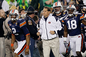 Cam Newton and Gene Chizik