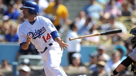 Los Angeles Dodgers third baseman Nomar Garciaparra swings the bat as he  warms up during batting practice before playing the Colorado Rockies in a  Major League Baseball game in Denver on Wednesday