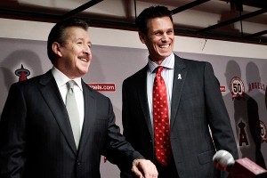 Los Angeles Angels owner Arte Moreno (left) introduces Jerry Dipoto as the 11th general manager in franchise history.