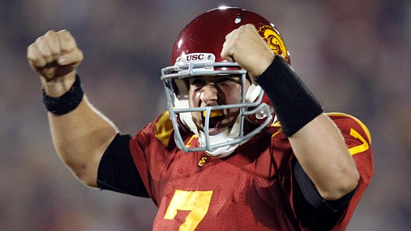 Southern California quarterback Matt Barkley celebrates a touchdown by teammate Rhett Ellison during the first half of an NCAA college football game against UCLA in Los Angeles on Saturday, Nov. 26, 2011.