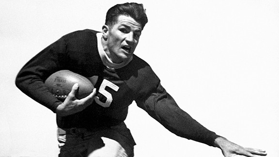 Sammy Baugh, backfield star of Texas Christian University, is demonstrating his sidestepping ability in Dallas, Dec. 15, 1936. TCU will face Marquette in the Cotton Bowl game on New Year's Day.