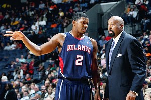 Scott Cunningham/NBAE/Getty Images Joe Johnson and Mike Woodson spent 