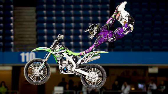 Kyle Sheppard Monster Energy Bruce Cook midair during the Global FMX demo