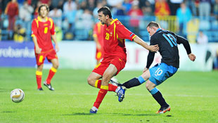 Wayne Rooney received a three-match ban, which was later reduced by one game, for kicking Montenegro's Miodrag Dzudovic.