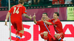 From left to right, Russia's Roman Pavlyuchenko Alan Dzagoev and Konstantin Zyryanov celebrate in their romp over the Czech Republic.