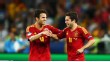 Jordi Alba and Cesc Fabregas celebrate during Spain's match against Italy in the Euro 2012 final.
