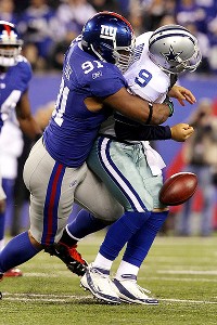Justin Tuck, Tony Romo