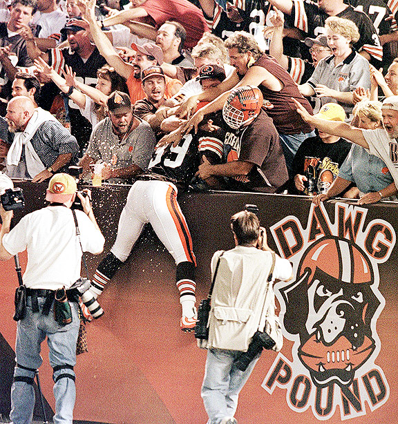 Marlon Forbes leaps into the arms of Cleveland Browns fans.
