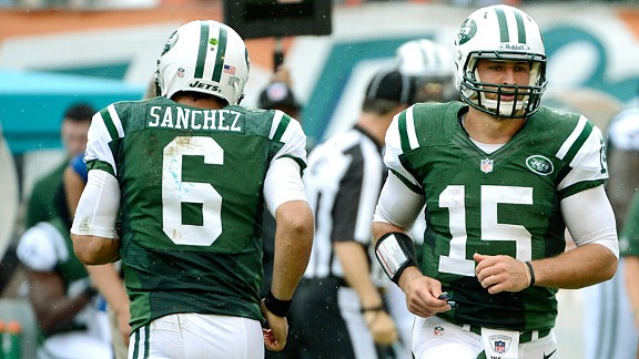 Tim Tebow and Mark Sanchez