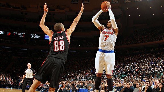 Blazers overcome Anthony's 45, spoil Amare's debut
