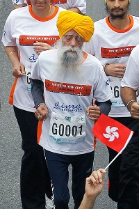 AP Photo/Kin CheungFauja Singh, the world's oldest marathon runner, runs his last race at the age of 101 on Sunday.