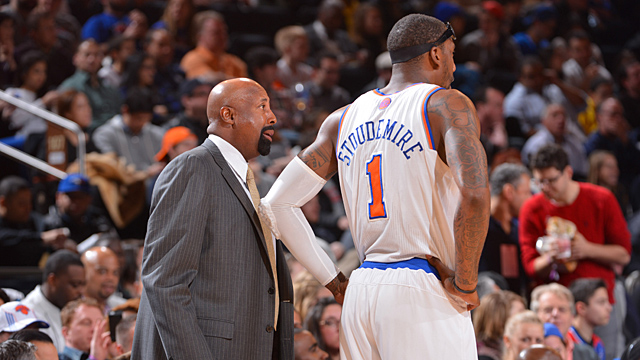 Amar'e Stoudemire #1 and Head Coach Mike Woodson of the New York Knicks