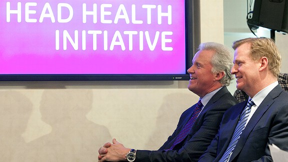 GE CEO Jeff Immelt, left, and Roger Goodell are working to further concussion prevention measures.