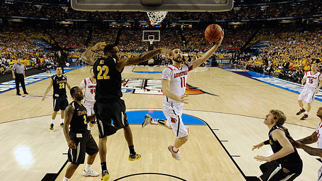 Louisville's Luke Hancock (11) shoots as Wichita State's Carl Hall (22)