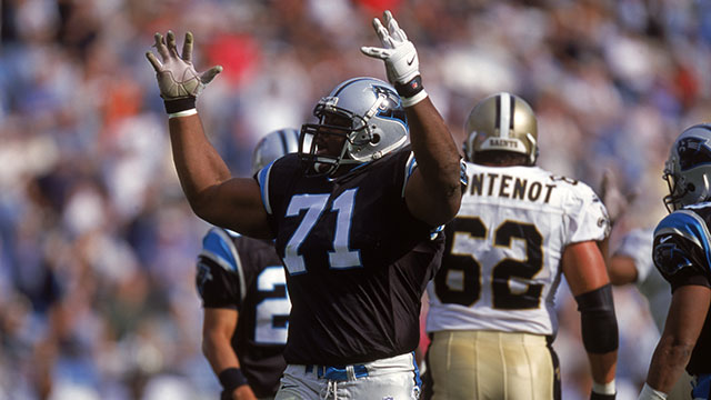 Al Lucas #71 of the Carolina Panthers celebrates on the field during the game against the New Orleans Saints at Ericsson Stadium on November 12, 2000 in Charlotte, North Carolina. The Panthers won 20-10.