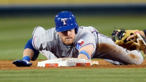 Rangers ship Gentry to A's in 4-player deal