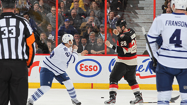 Matt Kassian #28 of the Ottawa Senators and Colton Orr #28 of the Toronto Maple Leafs