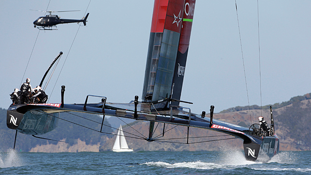 Oracle Team USA, left, and Emirates Team New Zealand