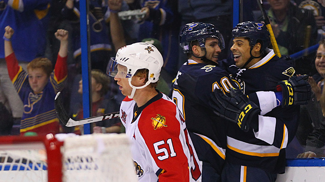 Maxim Lapierre #40 and Ryan Reaves #75 of the St. Louis Blues