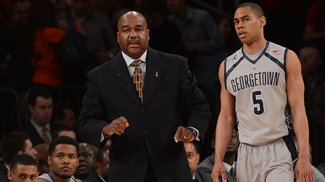 Georgetown Hoyas head coach John Thompson III talks with Georgetown Hoyas guard Markel Starks (5) during the first half of their Semifinal Round game of the Big East Championship at Madison Square Garden on Friday, March 15, 2013.