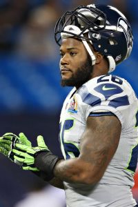 Robinson, illness gone, back with Seahawks