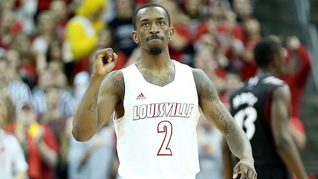Russ Smith #2 of the Louisville Cardinals celebrates during the game against the Cincinnati Bearcats at KFC YUM! Center on March 4, 2013 in Louisville, Kentucky.