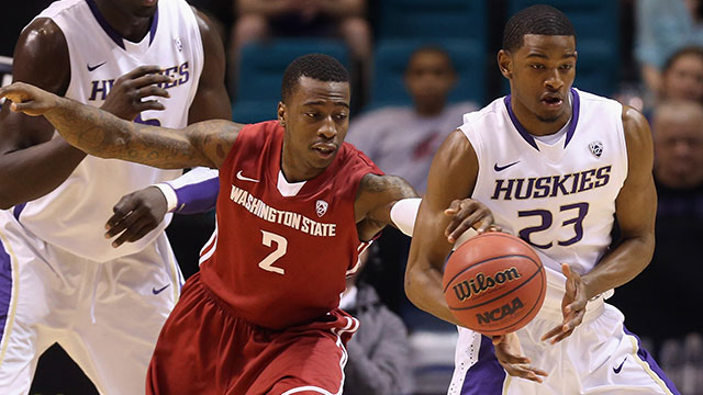 Mike Ladd #2 of the Washington State Cougars steals the ball from C.J. Wilcox #23 of the Washington Huskies in the first half during the first round of the Pac 12 Tournament at the MGM Grand Garden Arena on March 13, 2013 in Las Vegas, Nevada.
