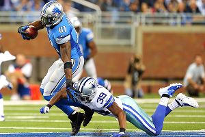 Calvin Johnson and Brandon Carr