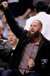 Nov 13, 2013; Boston, MA, USA; Boston Red Sox first baseman Mike Napoli reacts during the fourth quarter of the game between the Boston Celtics and the Charlotte Bobcats at TD Garden. The Charlotte Bobcats won 89-83.