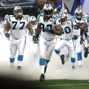 Kris Jenkins, Mike Rucker and Mike Minter of the Carolina Panthers.