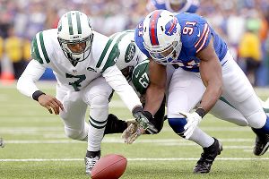 Geno Smith and Manny Lawson