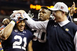 Auburn's Tre Mason and Gus Malzahn celebrate