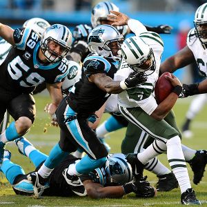 Captain Munnerlyn and Geno Smith